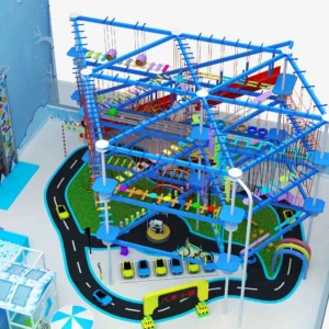 Commercial winter-theme indoor ropes course with blue steel frame, car town, and vehicle obstacles for family entertainment centers